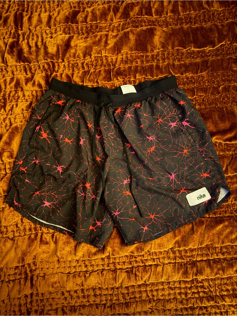 Nike Men’s Black Athletic Shorts with Red-Pink Burst Print